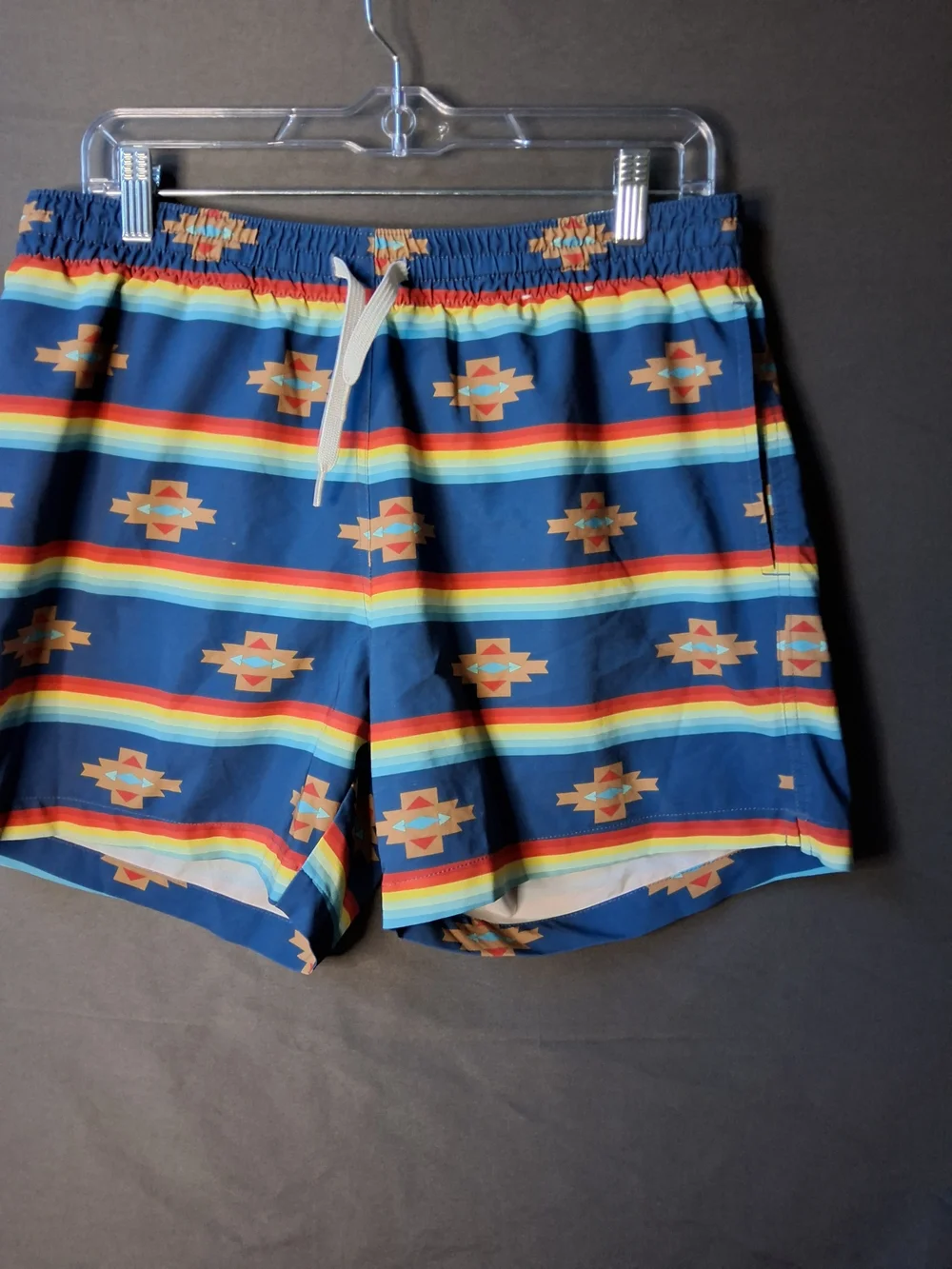 chubbies Navy Swim Trunks with Rainbow Stripes and Aztec Motif